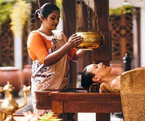 German tourist having ayurvedic treatment in Luxury Ayurveda resort in Bentota