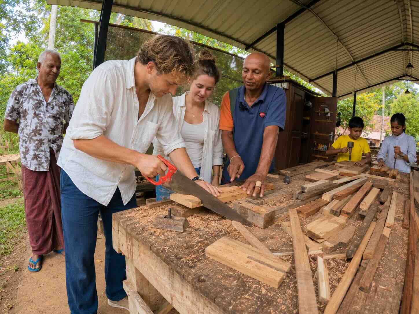 Hands-on wood-carving activity at Woody Land Artisans